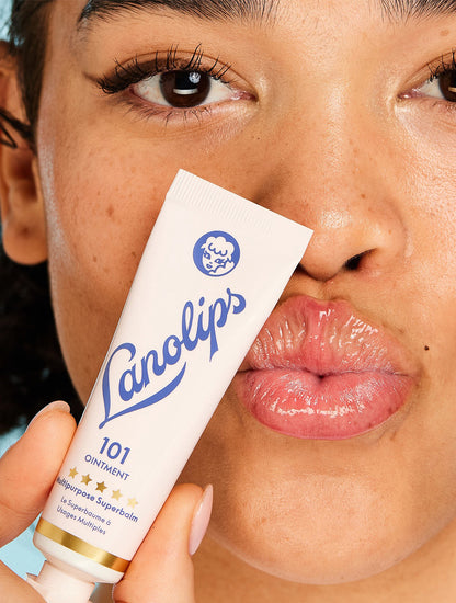 Model holding a tube of the Lanolips Original 101 Ointment - 15g. Voted the "World's Best Lip Balm". Using ultra-pure grade Aussie lanolin, our cult classic 101 Ointment offers a safer, more effective & 100% natural alternative to common petroleum-based balms.

It’s not greasy or sticky, and it’s so safe you could even use as a nipple cream with nursing infants.