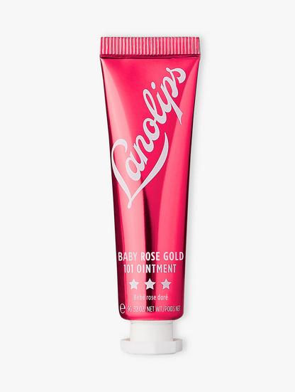 Product shot of the Lanolips Baby Rose Gold 101 Ointment, featuring the closed tube. Intense lanolin hydration meets a dewy rose-flushed tint.